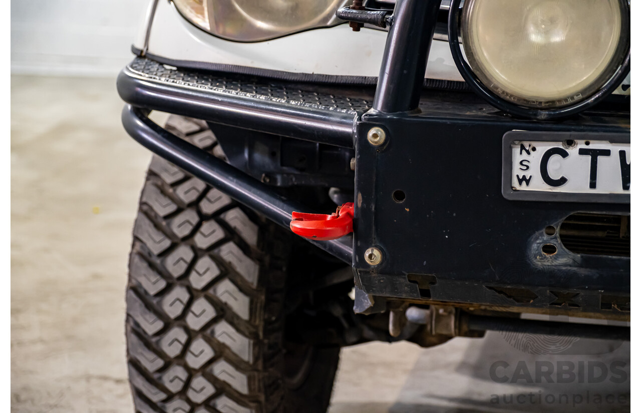 10/2014 Mitsubishi Triton Glx-R (4x4) MN MY14 Update 4d Double Cab Utility White Turbo Diesel 2.5L