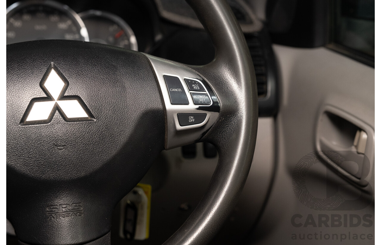 10/2014 Mitsubishi Triton Glx-R (4x4) MN MY14 Update 4d Double Cab Utility White Turbo Diesel 2.5L