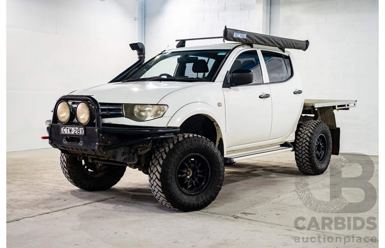 10/2014 Mitsubishi Triton Glx-R (4x4) MN MY14 Update 4d Double Cab Utility White Turbo Diesel 2.5L