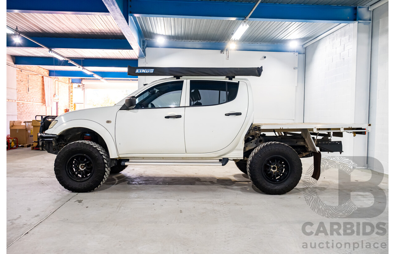10/2014 Mitsubishi Triton Glx-R (4x4) MN MY14 Update 4d Double Cab Utility White Turbo Diesel 2.5L
