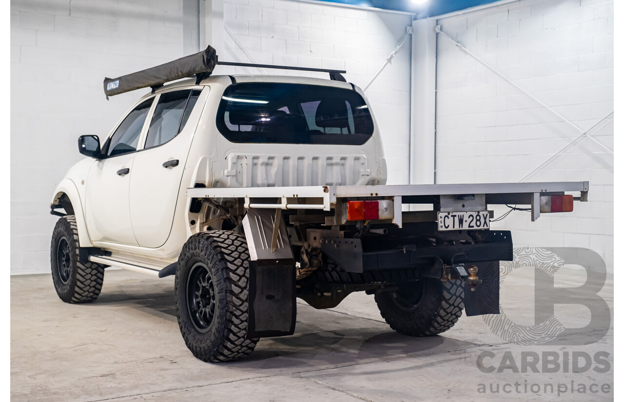 10/2014 Mitsubishi Triton Glx-R (4x4) MN MY14 Update 4d Double Cab Utility White Turbo Diesel 2.5L