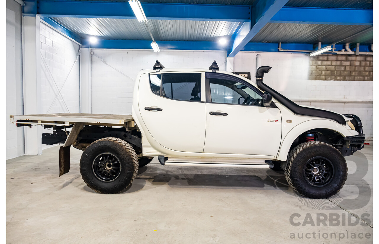 10/2014 Mitsubishi Triton Glx-R (4x4) MN MY14 Update 4d Double Cab Utility White Turbo Diesel 2.5L