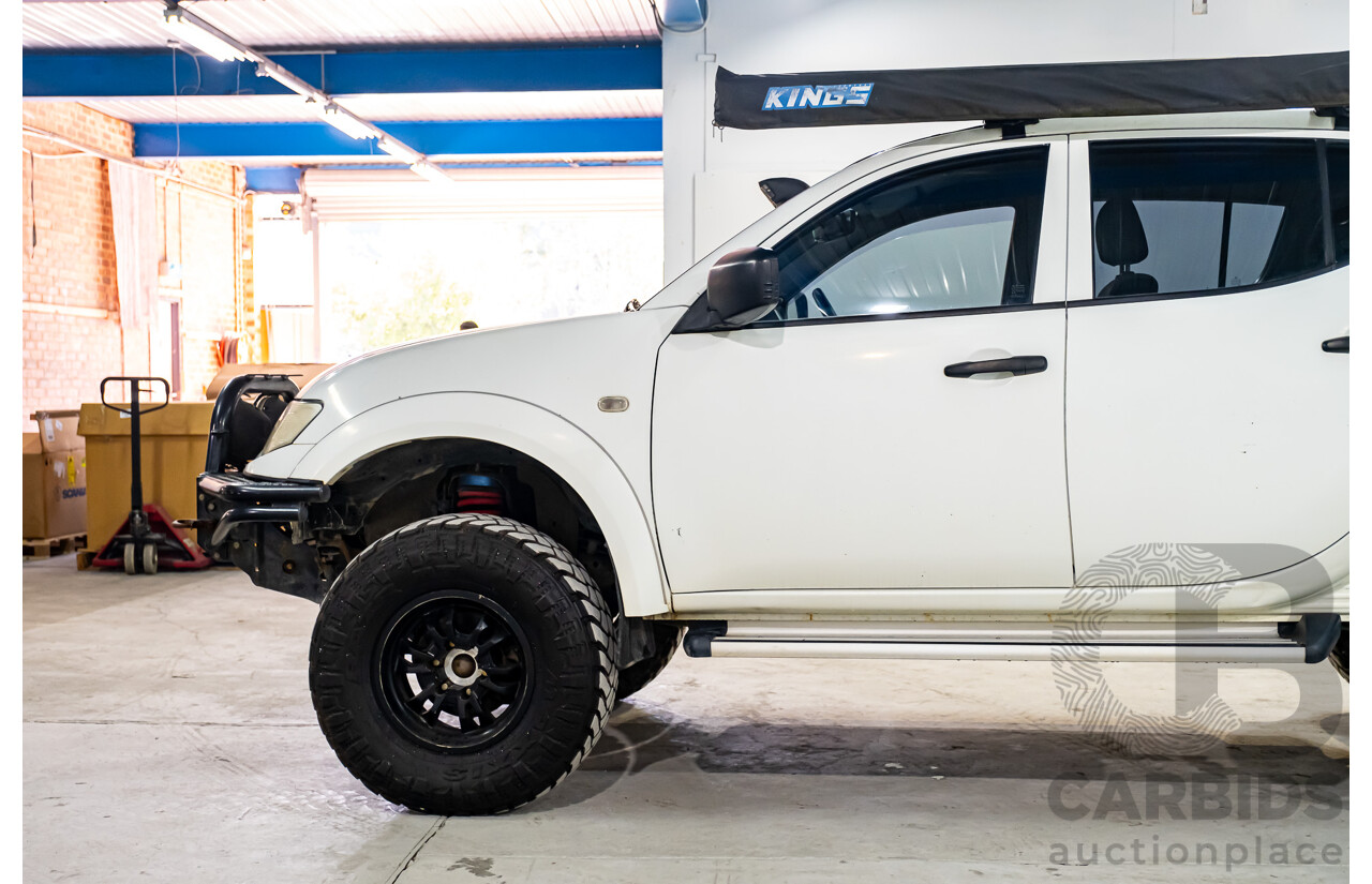 10/2014 Mitsubishi Triton Glx-R (4x4) MN MY14 Update 4d Double Cab Utility White Turbo Diesel 2.5L