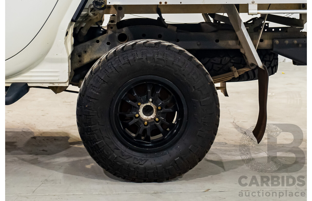 10/2014 Mitsubishi Triton Glx-R (4x4) MN MY14 Update 4d Double Cab Utility White Turbo Diesel 2.5L