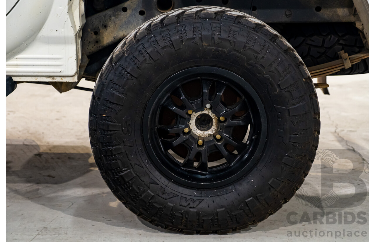 10/2014 Mitsubishi Triton Glx-R (4x4) MN MY14 Update 4d Double Cab Utility White Turbo Diesel 2.5L