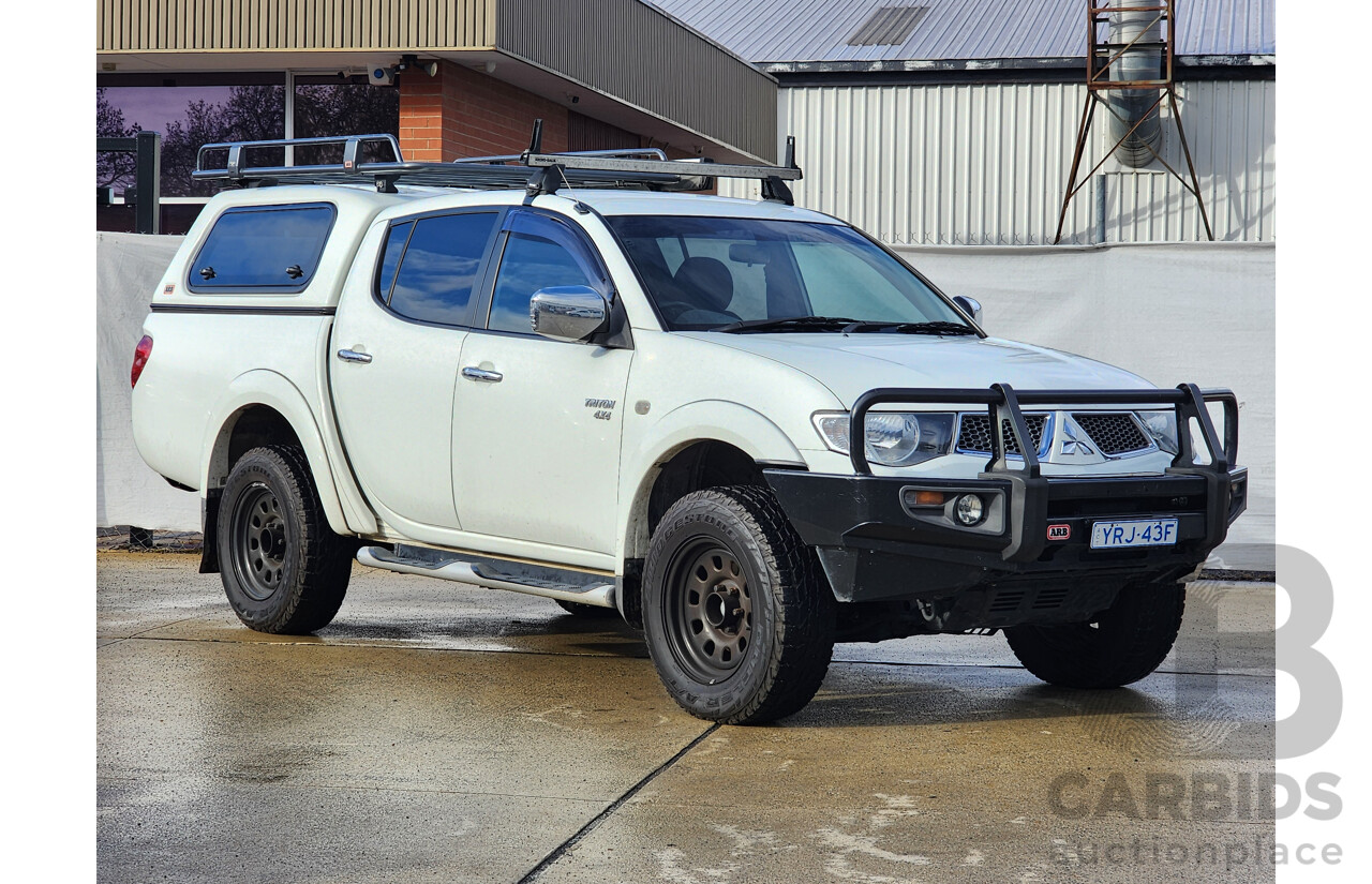 03/2011 Mitsubishi Triton GLX-R (4x4) MN MY11 Double Cab Utility White 2.5L