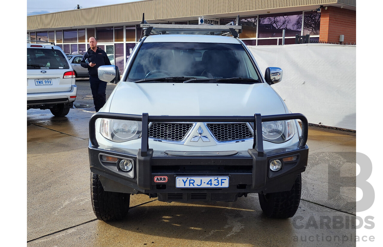 03/2011 Mitsubishi Triton GLX-R (4x4) MN MY11 Double Cab Utility White 2.5L
