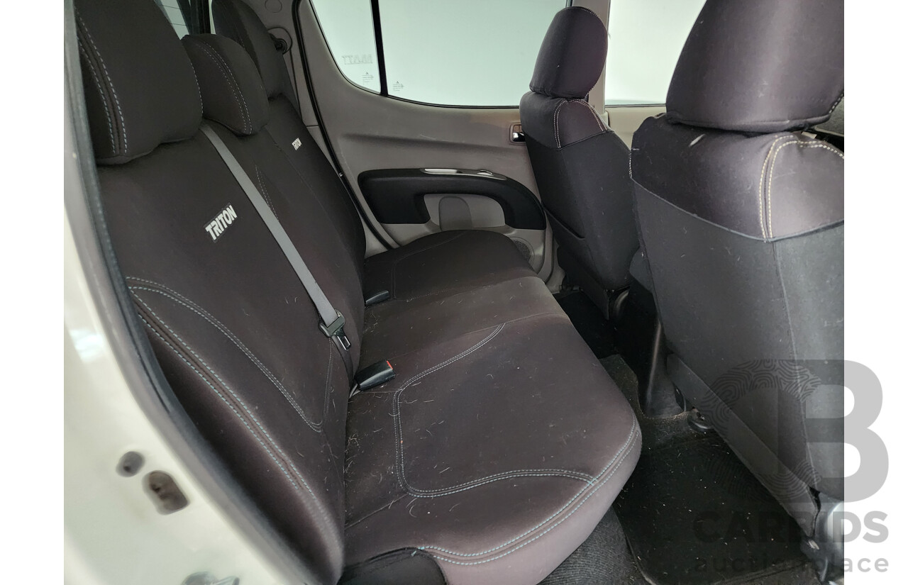 03/2011 Mitsubishi Triton GLX-R (4x4) MN MY11 Double Cab Utility White 2.5L