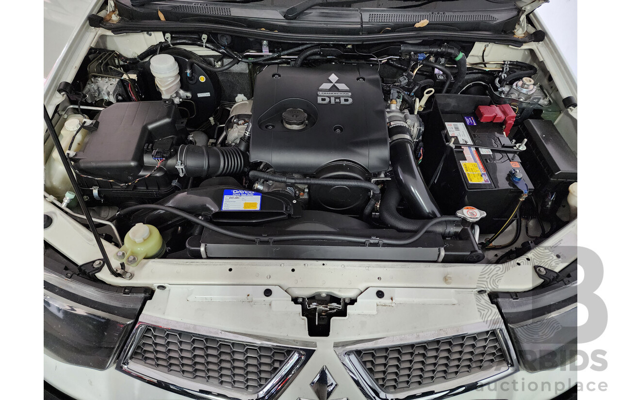 03/2011 Mitsubishi Triton GLX-R (4x4) MN MY11 Double Cab Utility White 2.5L