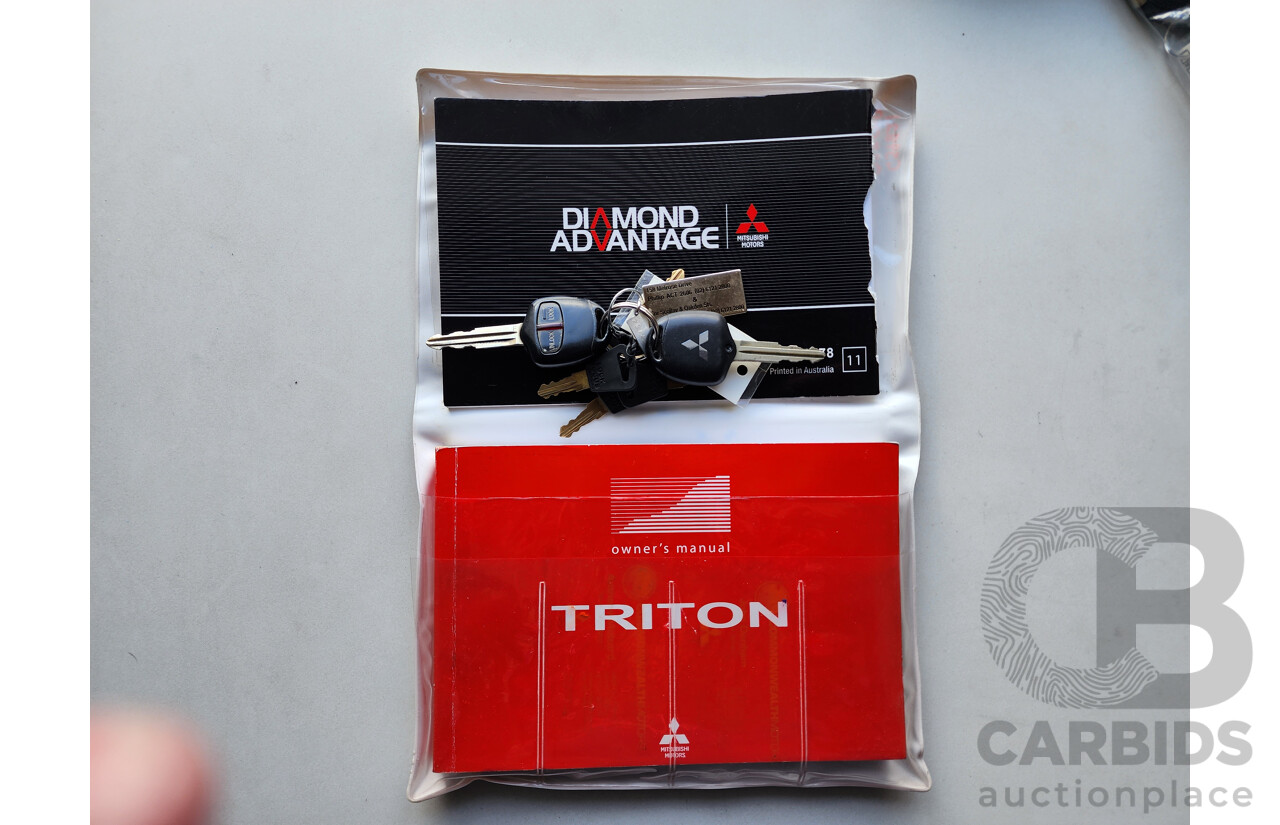 03/2011 Mitsubishi Triton GLX-R (4x4) MN MY11 Double Cab Utility White 2.5L