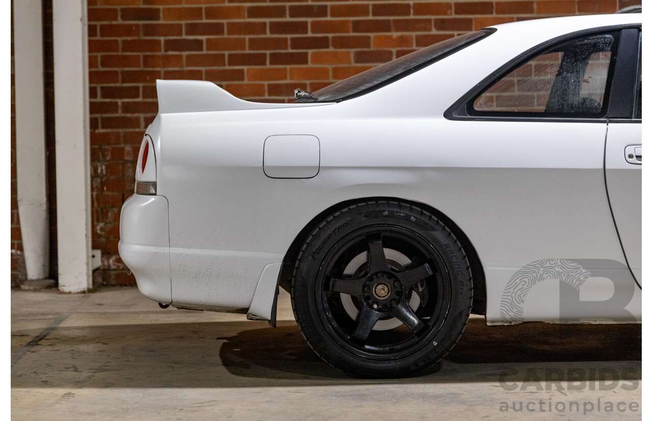 10/1994 Nissan Skyline R33 2d Coupe Ivory Matte White Wrap Turbo 4.0L - Modified with Barra Conversion - 07/2008 Import