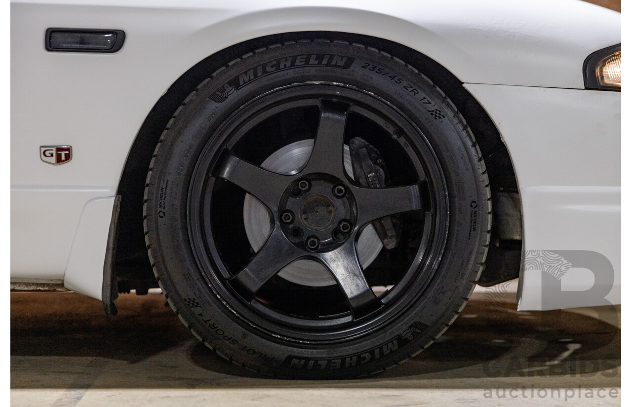 10/1994 Nissan Skyline R33 2d Coupe Ivory Matte White Wrap Turbo 4.0L - Modified with Barra Conversion - 07/2008 Import