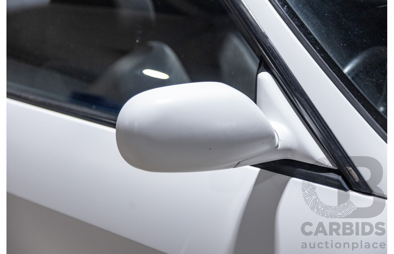 10/1994 Nissan Skyline R33 2d Coupe Ivory Matte White Wrap Turbo 4.0L - Modified with Barra Conversion - 07/2008 Import