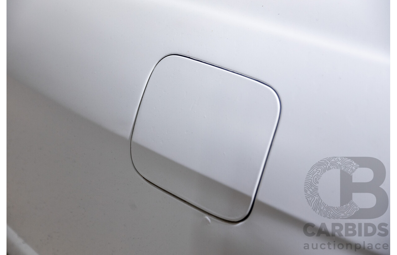 10/1994 Nissan Skyline R33 2d Coupe Ivory Matte White Wrap Turbo 4.0L - Modified with Barra Conversion - 07/2008 Import