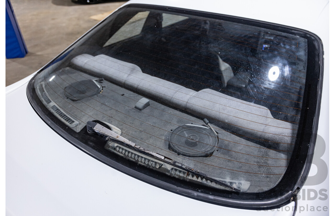 10/1994 Nissan Skyline R33 2d Coupe Ivory Matte White Wrap Turbo 4.0L - Modified with Barra Conversion - 07/2008 Import