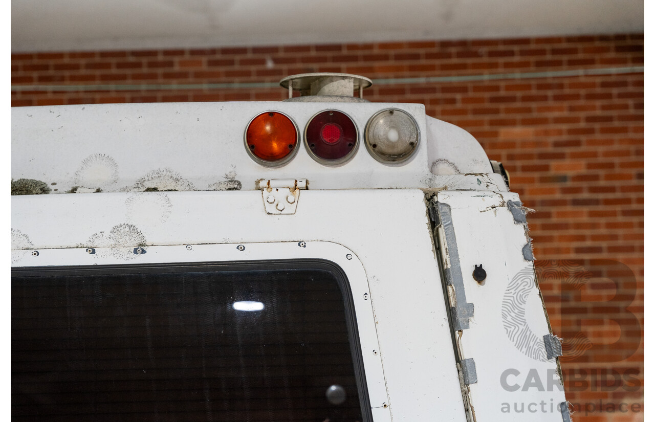 6/1991 Ford F350 Custom (4x4) 2d Ex-Ambulance White V8 5.8L