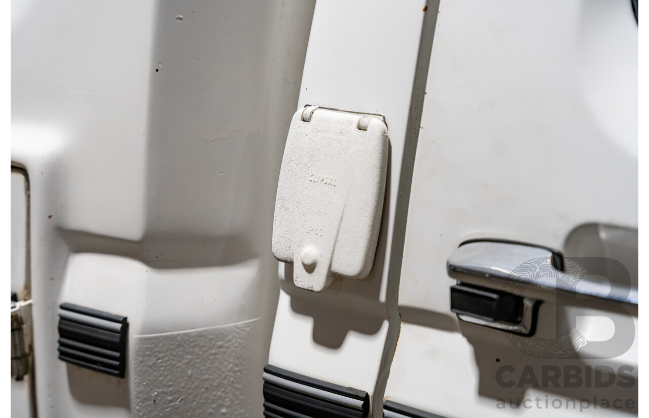 6/1991 Ford F350 Custom (4x4) 2d Ex-Ambulance White V8 5.8L