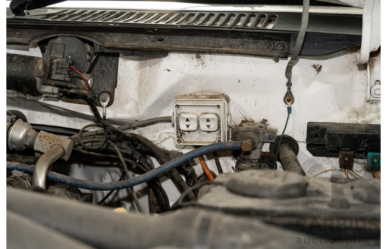 6/1991 Ford F350 Custom (4x4) 2d Ex-Ambulance White V8 5.8L