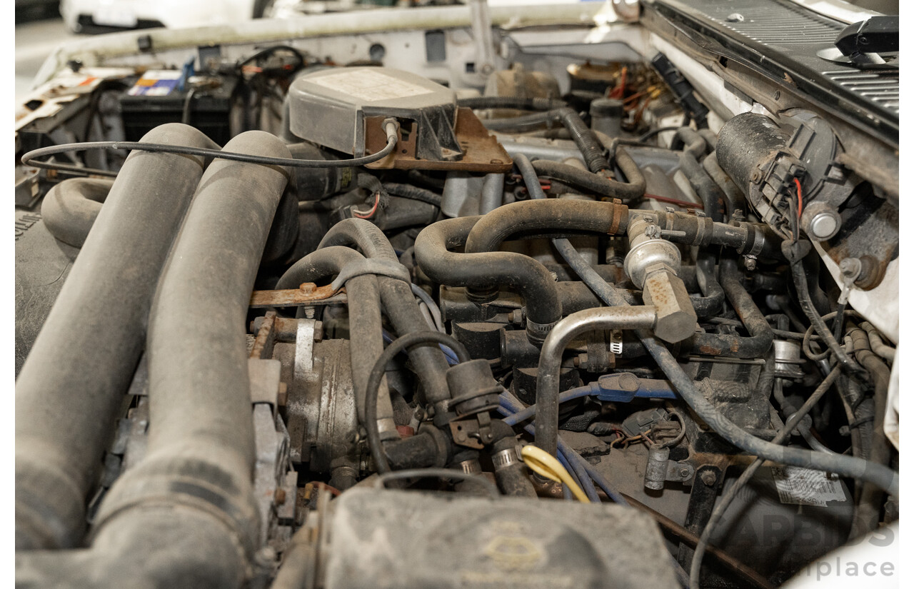 6/1991 Ford F350 Custom (4x4) 2d Ex-Ambulance White V8 5.8L