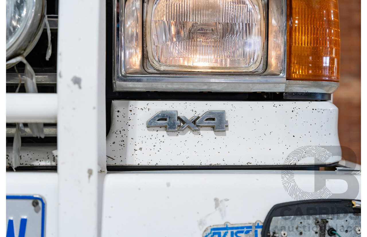 6/1991 Ford F350 Custom (4x4) 2d Ex-Ambulance White V8 5.8L