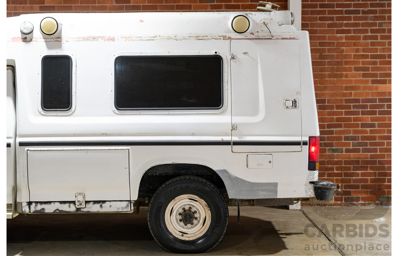 6/1991 Ford F350 Custom (4x4) 2d Ex-Ambulance White V8 5.8L