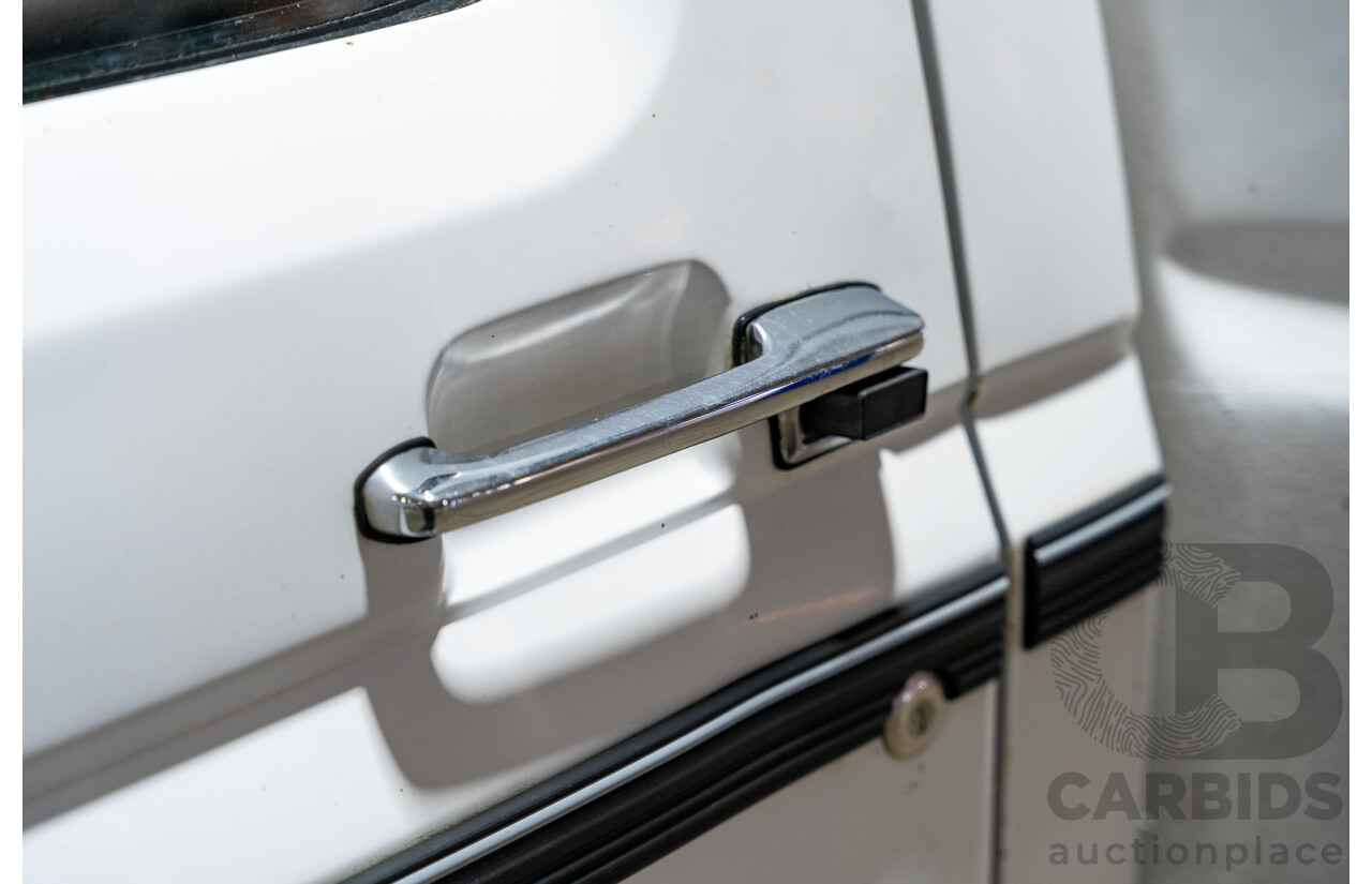 6/1991 Ford F350 Custom (4x4) 2d Ex-Ambulance White V8 5.8L