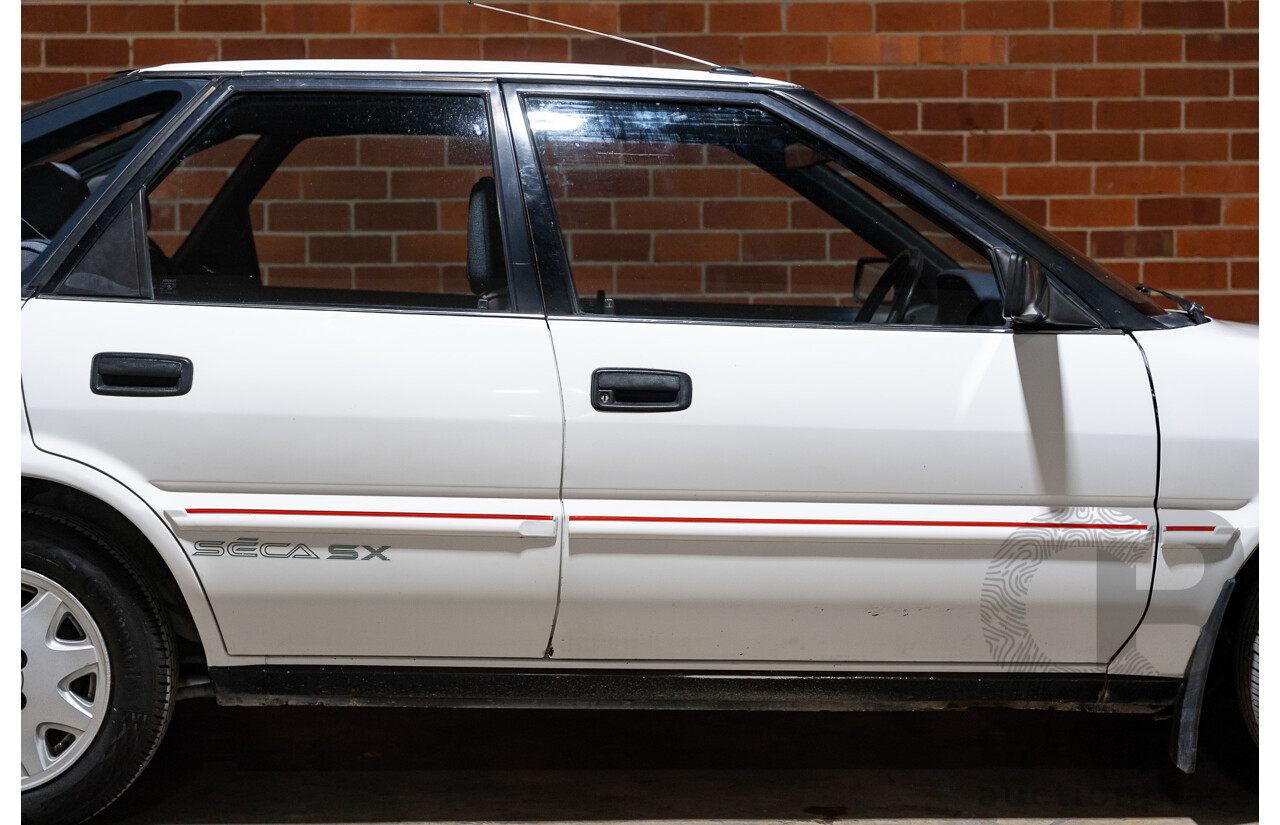 10/1990 Toyota Corolla SX SECA AE93 5d Liftback White 4A-GE 1.6L