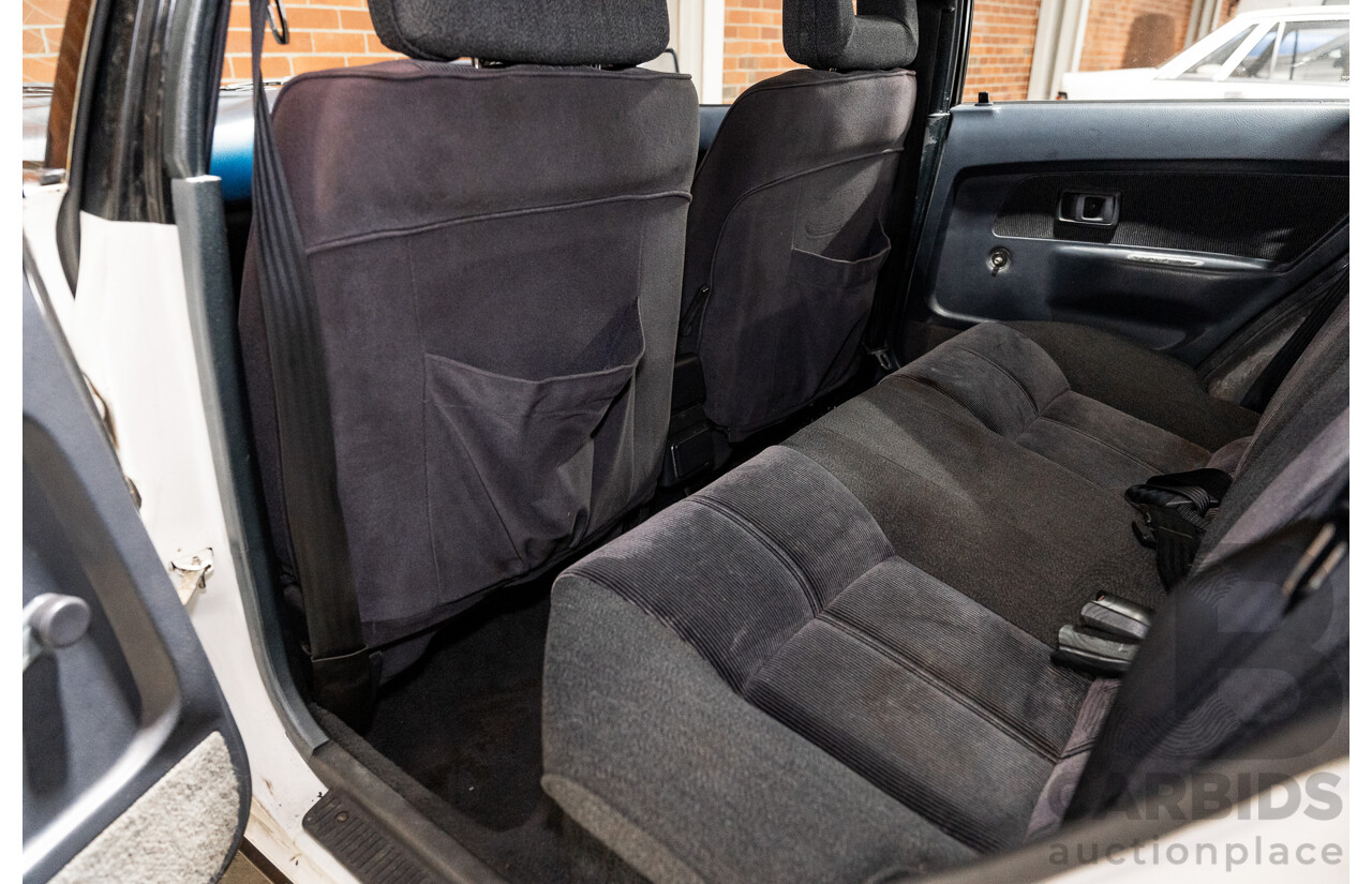 10/1990 Toyota Corolla SX SECA AE93 5d Liftback White 4A-GE 1.6L