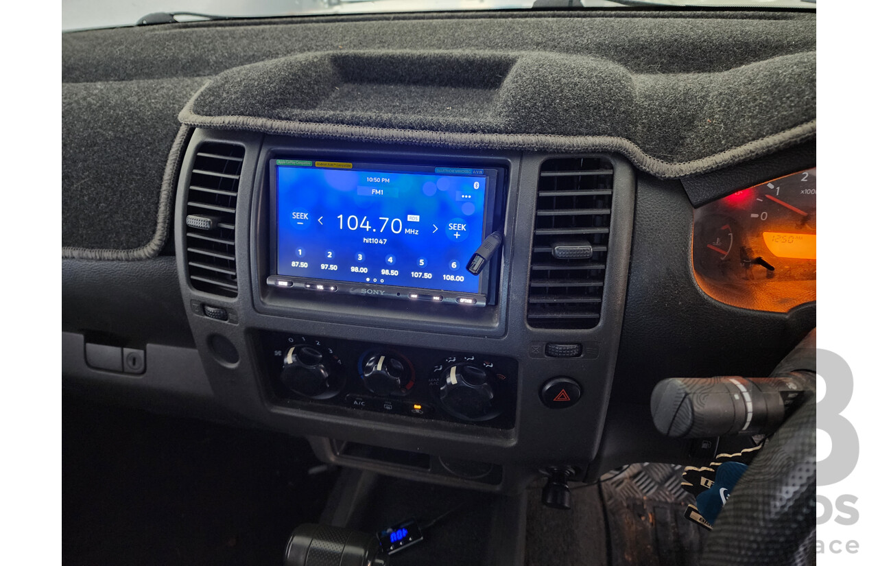 04/2012 Nissan Navara RX (4x2) RWD D40 MY11 Dual Cab P/Up Silver 2.5L