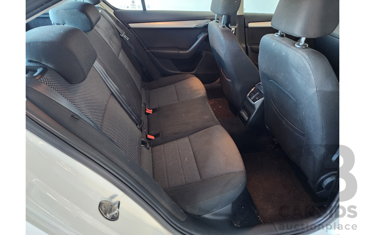 04/2014 Skoda Octavia 103 TSI AMBITION PLUS FWD NE 5D Hatchback White 1.4L