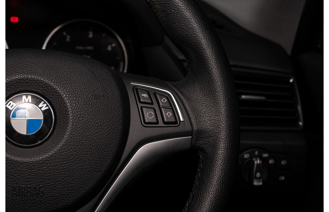 5/2015 BMW X1 Sdrive 18d E84 MY15 4d Wagon Midnight Blue Metallic Turbo Diesel 2.0L