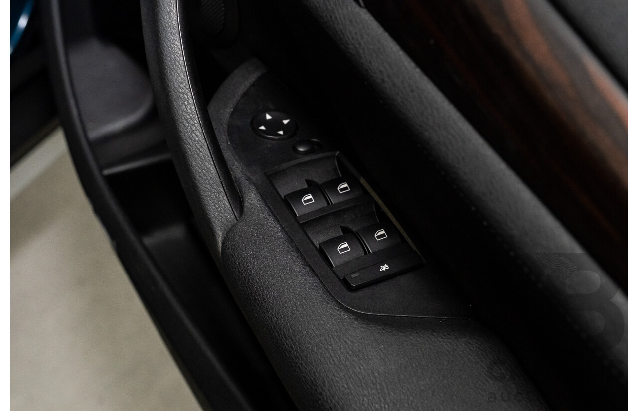 5/2015 BMW X1 Sdrive 18d E84 MY15 4d Wagon Midnight Blue Metallic Turbo Diesel 2.0L