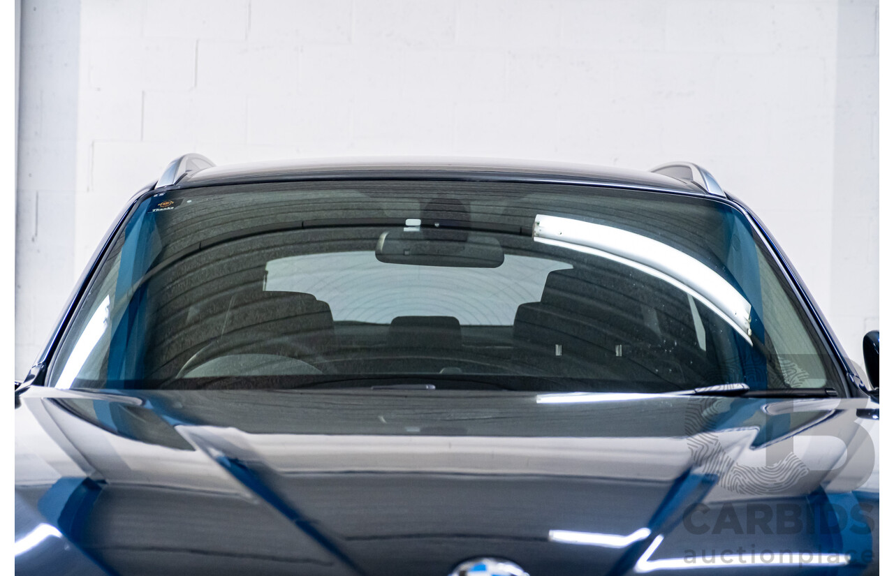 5/2015 BMW X1 Sdrive 18d E84 MY15 4d Wagon Midnight Blue Metallic Turbo Diesel 2.0L