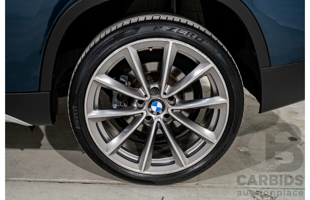 5/2015 BMW X1 Sdrive 18d E84 MY15 4d Wagon Midnight Blue Metallic Turbo Diesel 2.0L