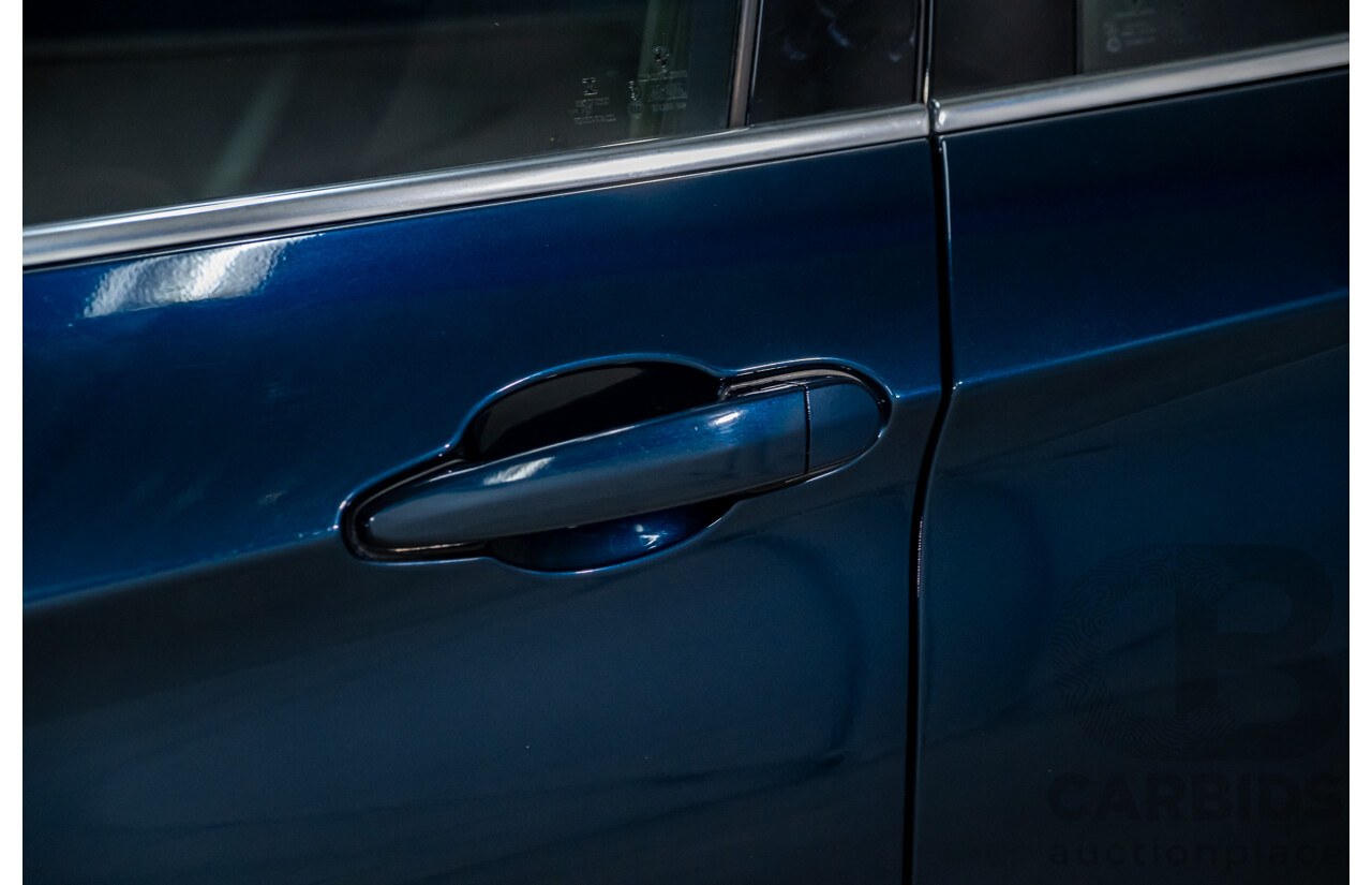 5/2015 BMW X1 Sdrive 18d E84 MY15 4d Wagon Midnight Blue Metallic Turbo Diesel 2.0L