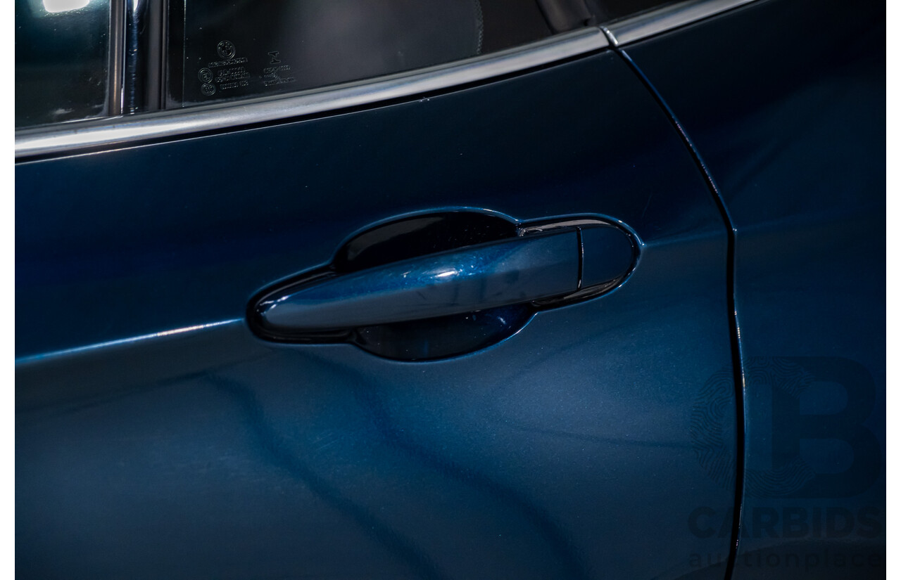 5/2015 BMW X1 Sdrive 18d E84 MY15 4d Wagon Midnight Blue Metallic Turbo Diesel 2.0L