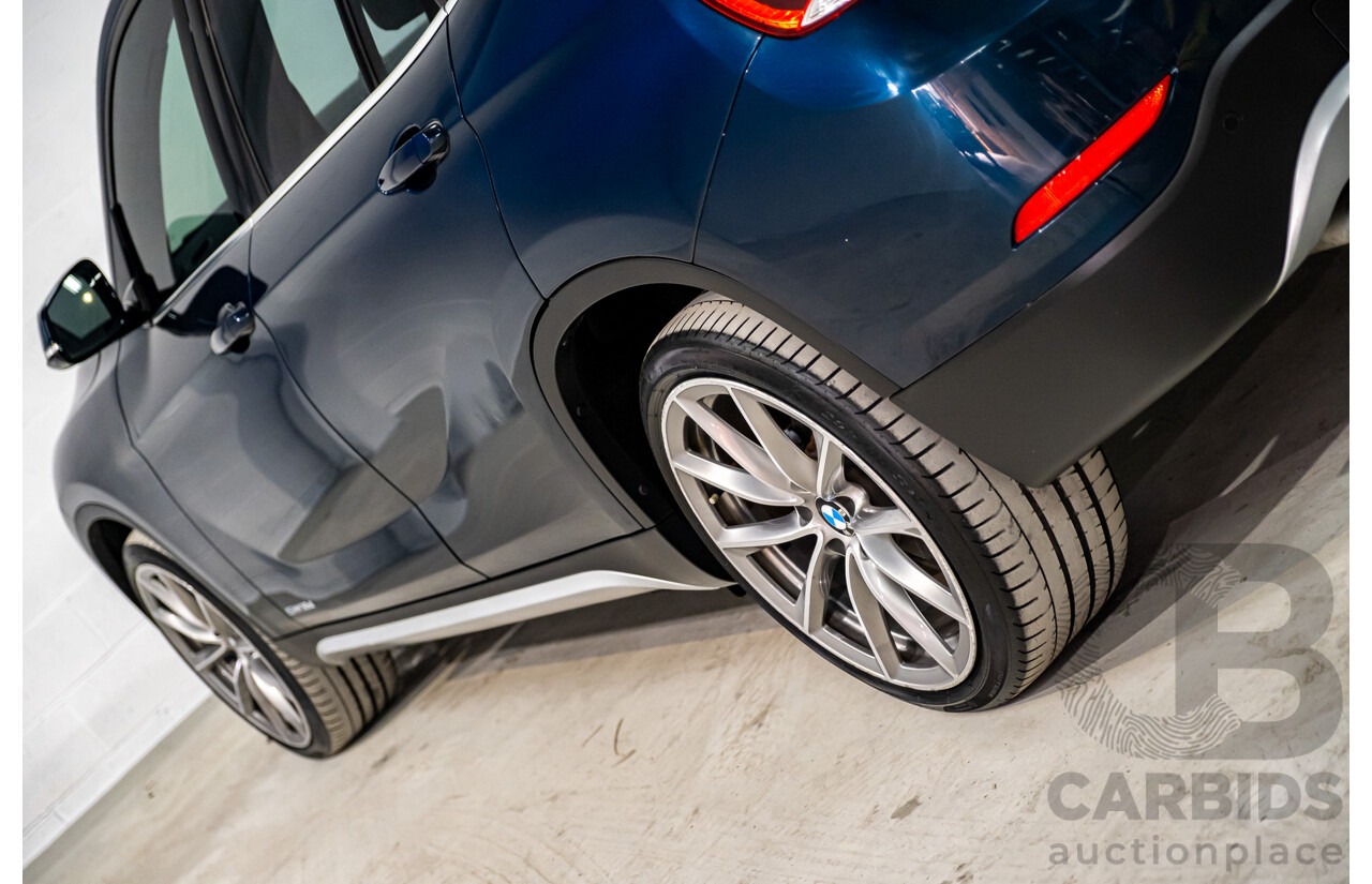 5/2015 BMW X1 Sdrive 18d E84 MY15 4d Wagon Midnight Blue Metallic Turbo Diesel 2.0L