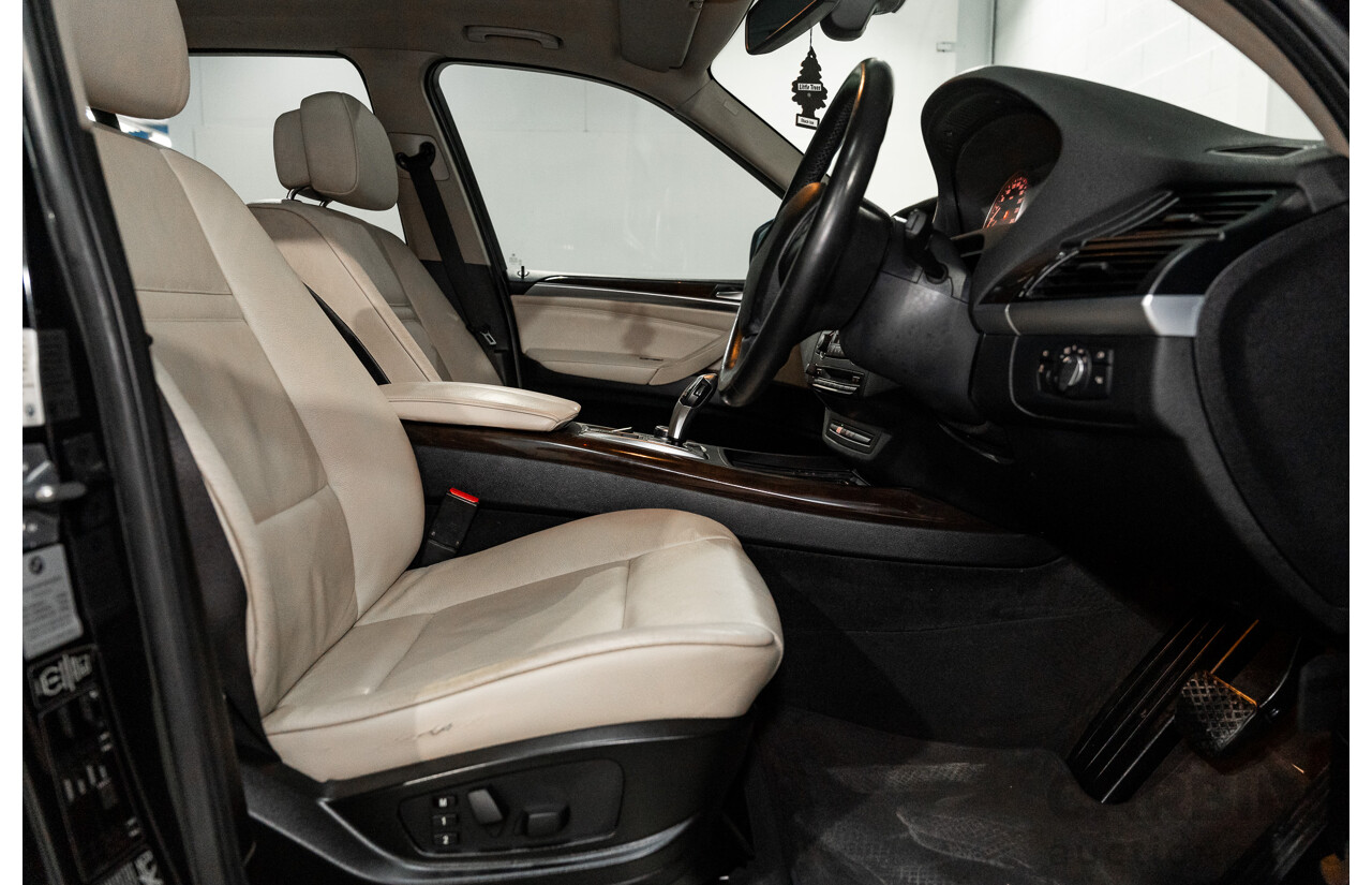 1/2012 BMW X5 Xdrive 35i E70 MY12 Upgrade 4d Wagon Black Turbo 3.0L - 7 Seater