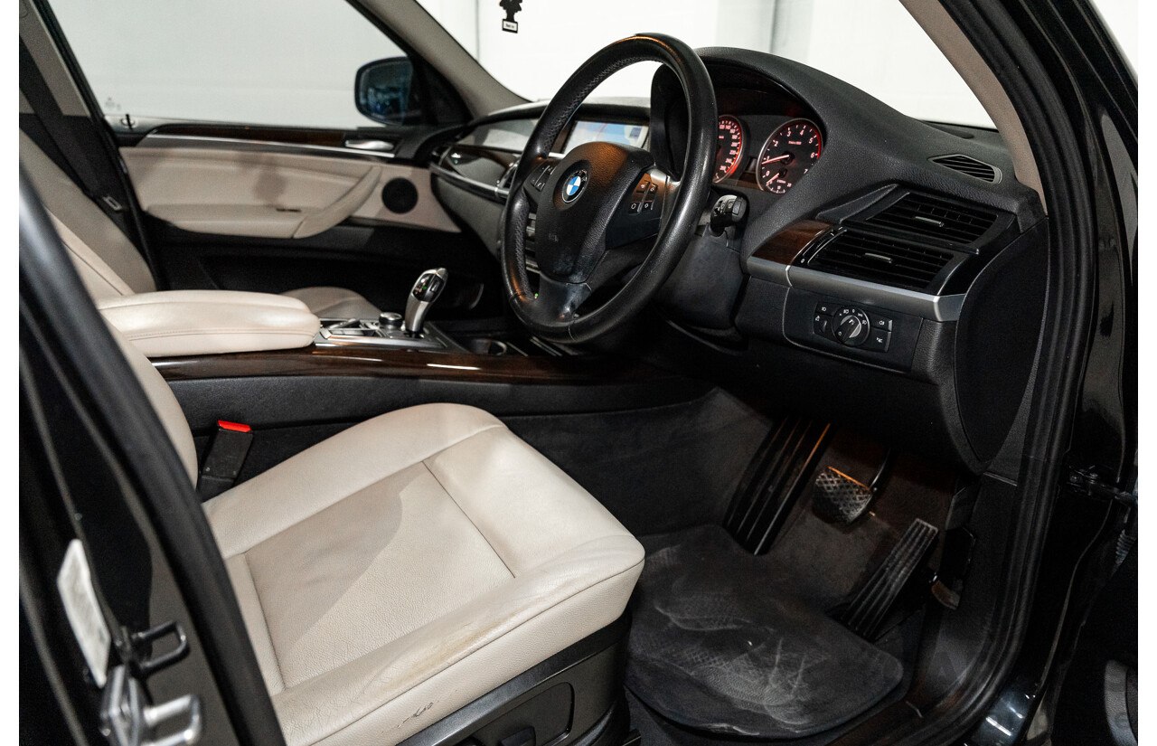 1/2012 BMW X5 Xdrive 35i E70 MY12 Upgrade 4d Wagon Black Turbo 3.0L - 7 Seater