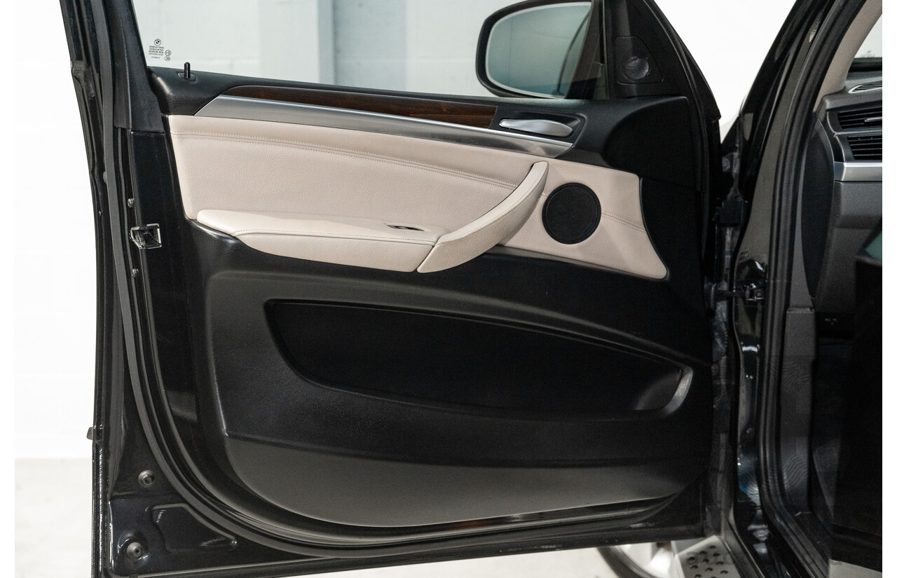 1/2012 BMW X5 Xdrive 35i E70 MY12 Upgrade 4d Wagon Black Turbo 3.0L - 7 Seater