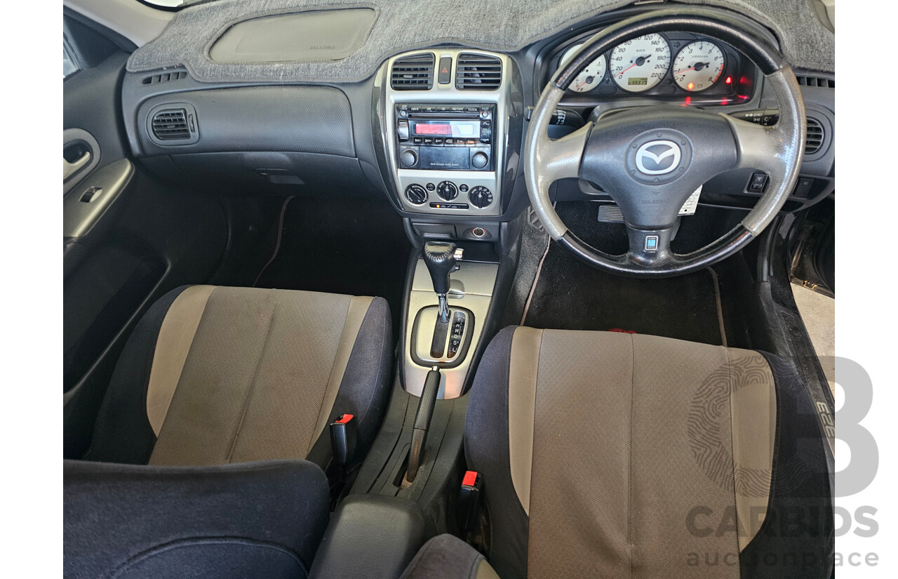 9/2002 Mazda 323 Protege SP20  4d Sedan Black 2.0L