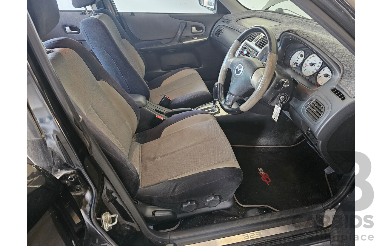 9/2002 Mazda 323 Protege SP20  4d Sedan Black 2.0L