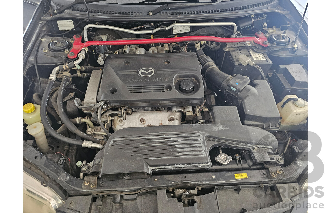 9/2002 Mazda 323 Protege SP20  4d Sedan Black 2.0L
