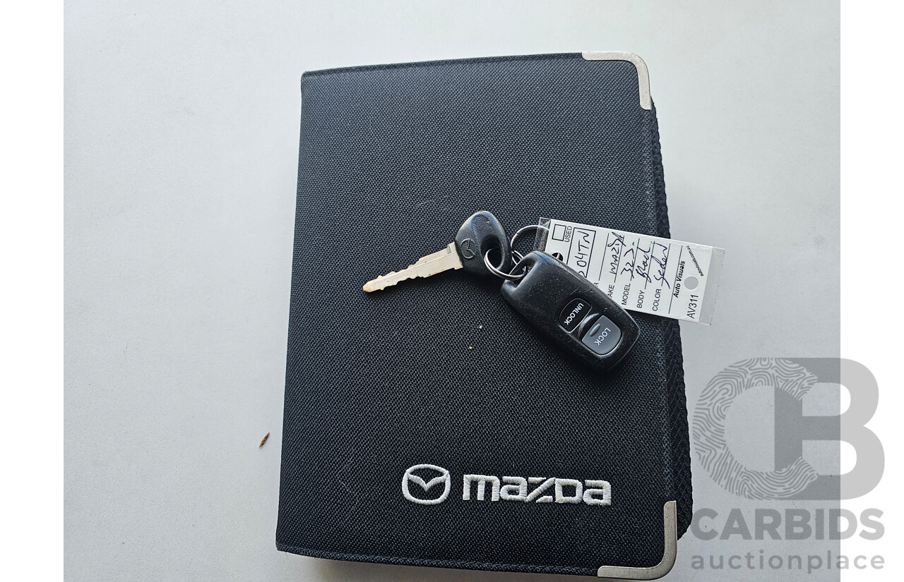 9/2002 Mazda 323 Protege SP20  4d Sedan Black 2.0L