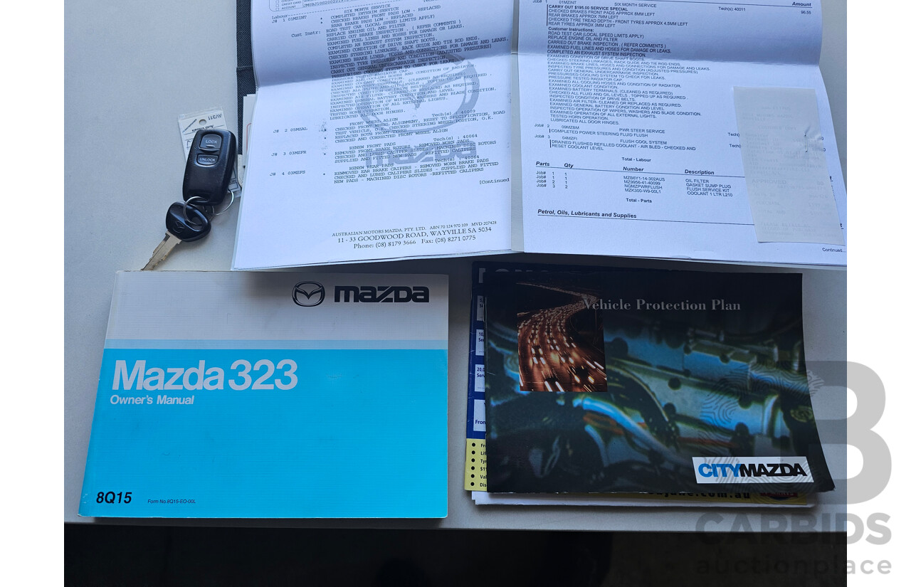 9/2002 Mazda 323 Protege SP20  4d Sedan Black 2.0L