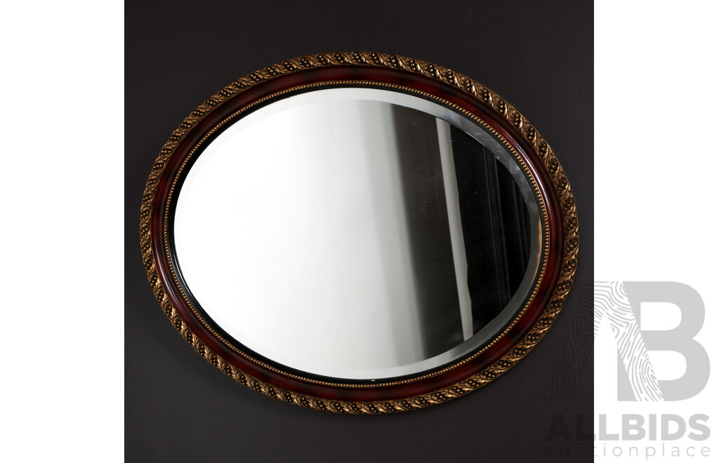 Oval Mirror with Gilt Highlights