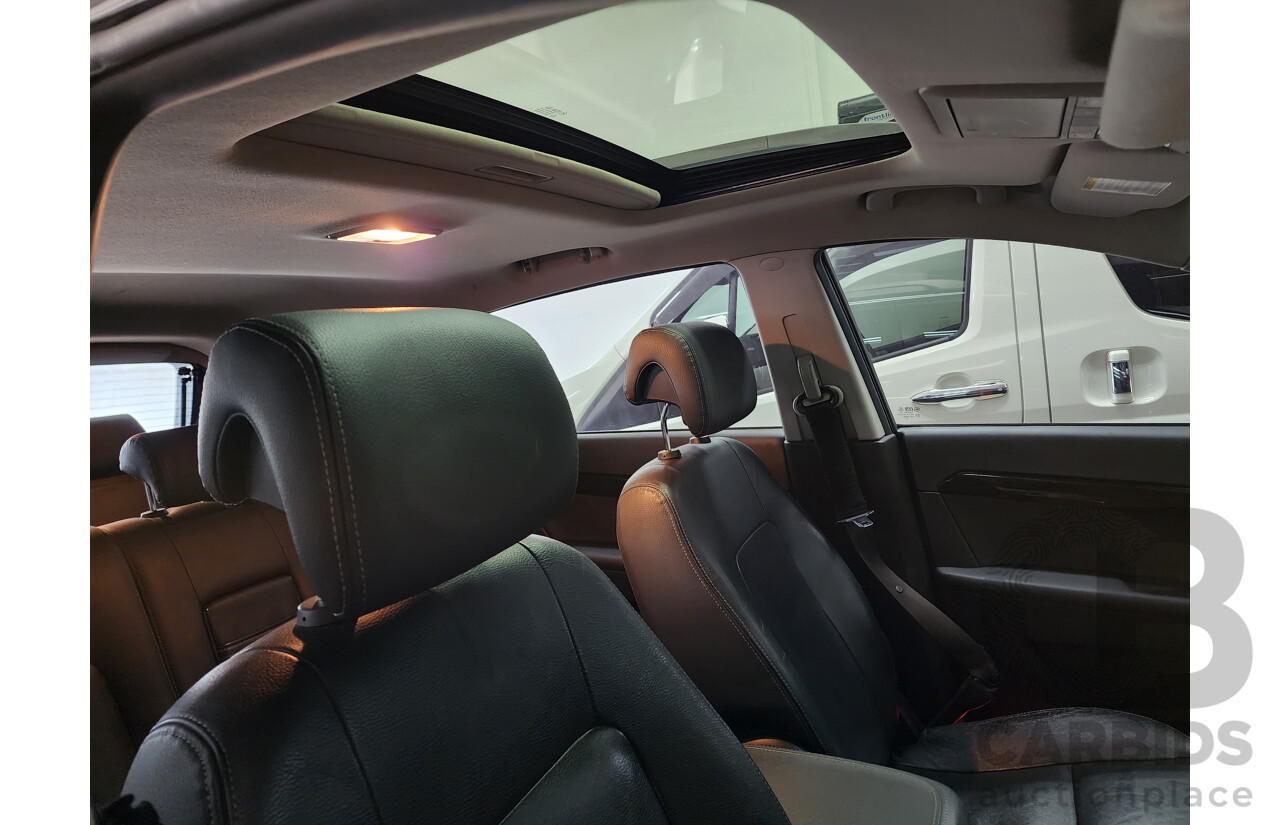 10/2012 Holden Captiva 7 LX (4x4) AWD CG MY12 4D Wagon Black 2.2L