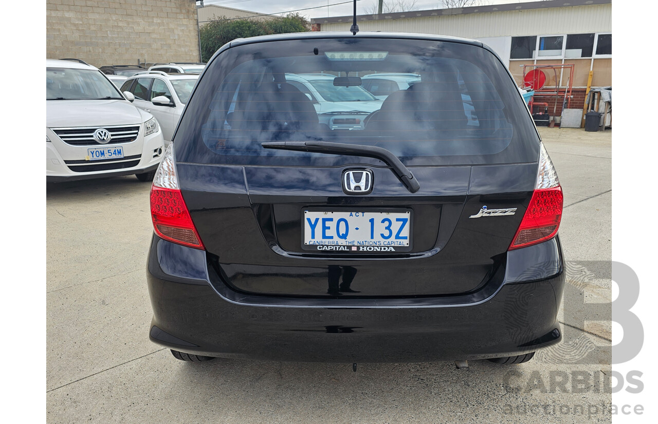 9/2006 Honda Jazz VTi MY06 5d Hatchback Black 1.5L