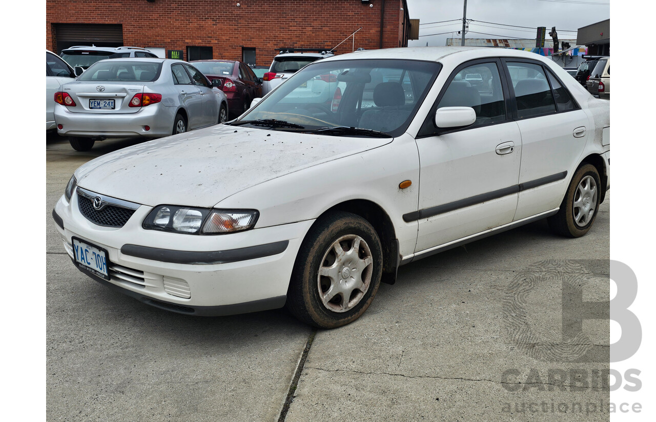 3/1998 Mazda 626 Classic 4d Sedan White 2.0L