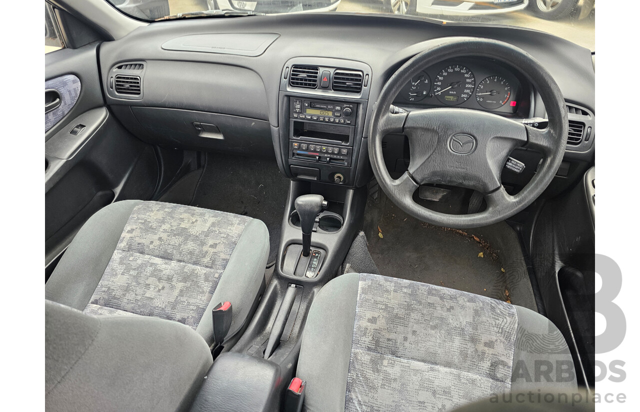 3/1998 Mazda 626 Classic  4d Sedan White 2.0L